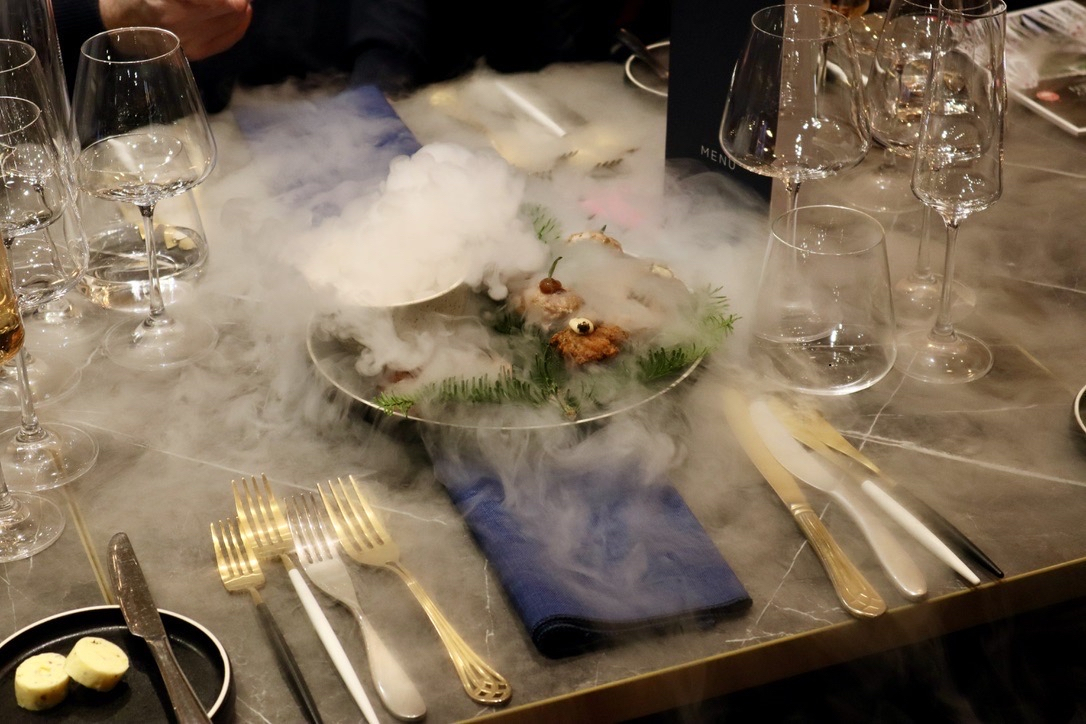 Delicious food surrounded by artificial fog
