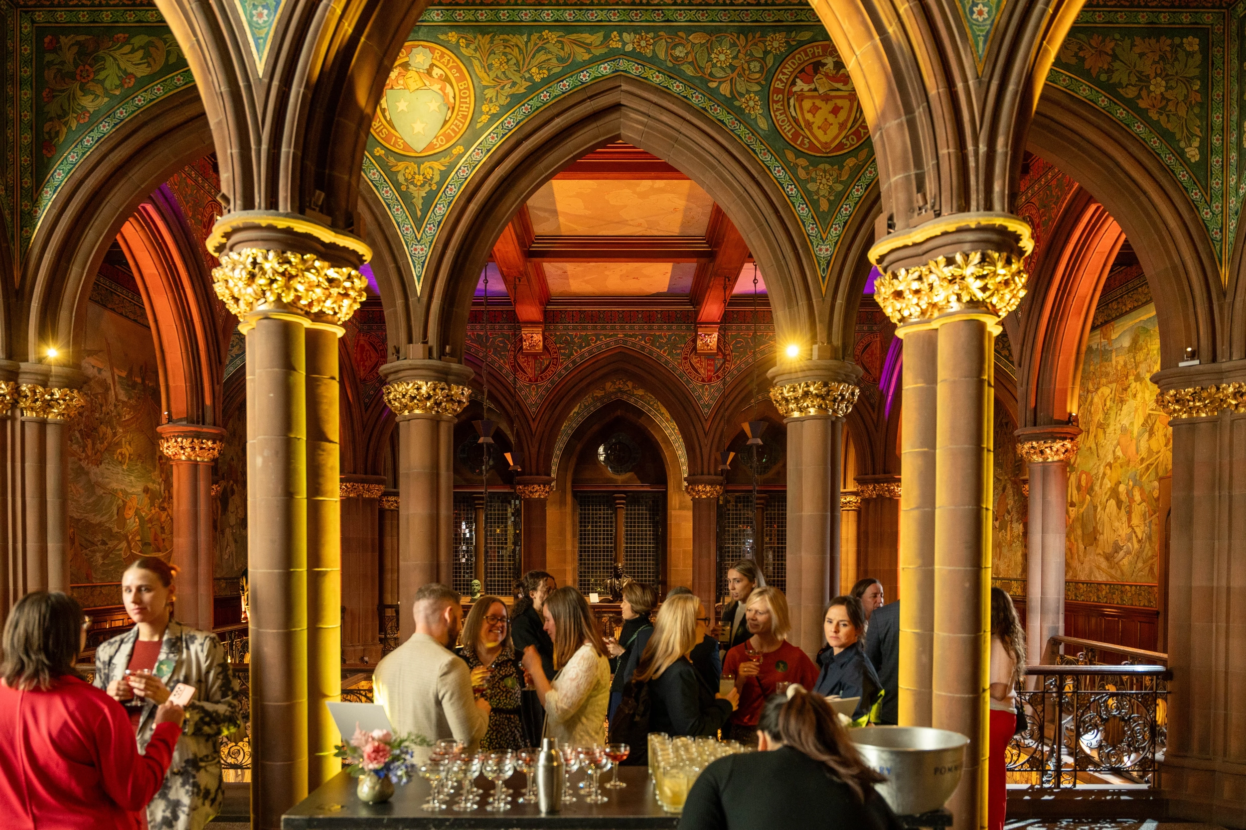 People during an event in a beautiful room