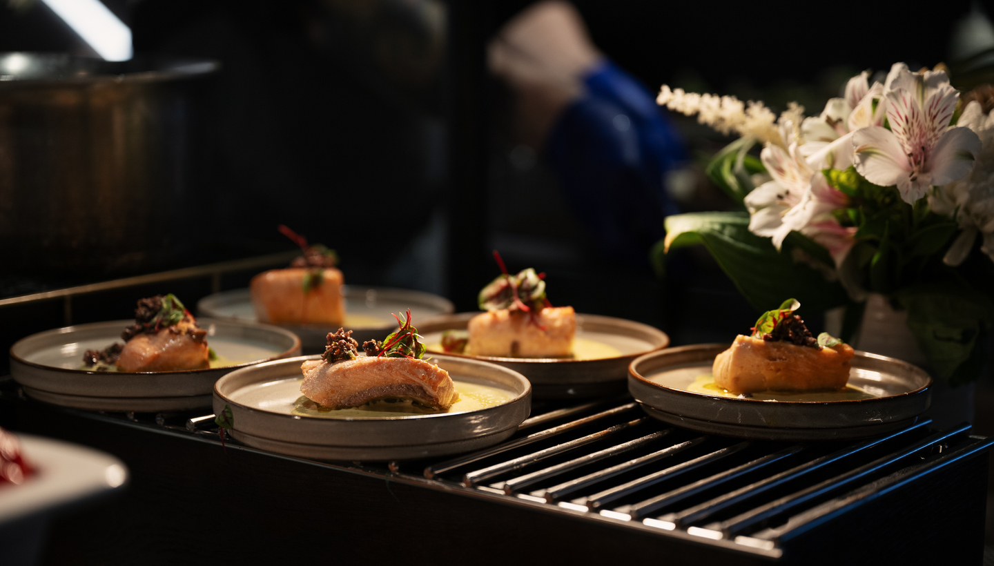 Chefs talking in kitchen