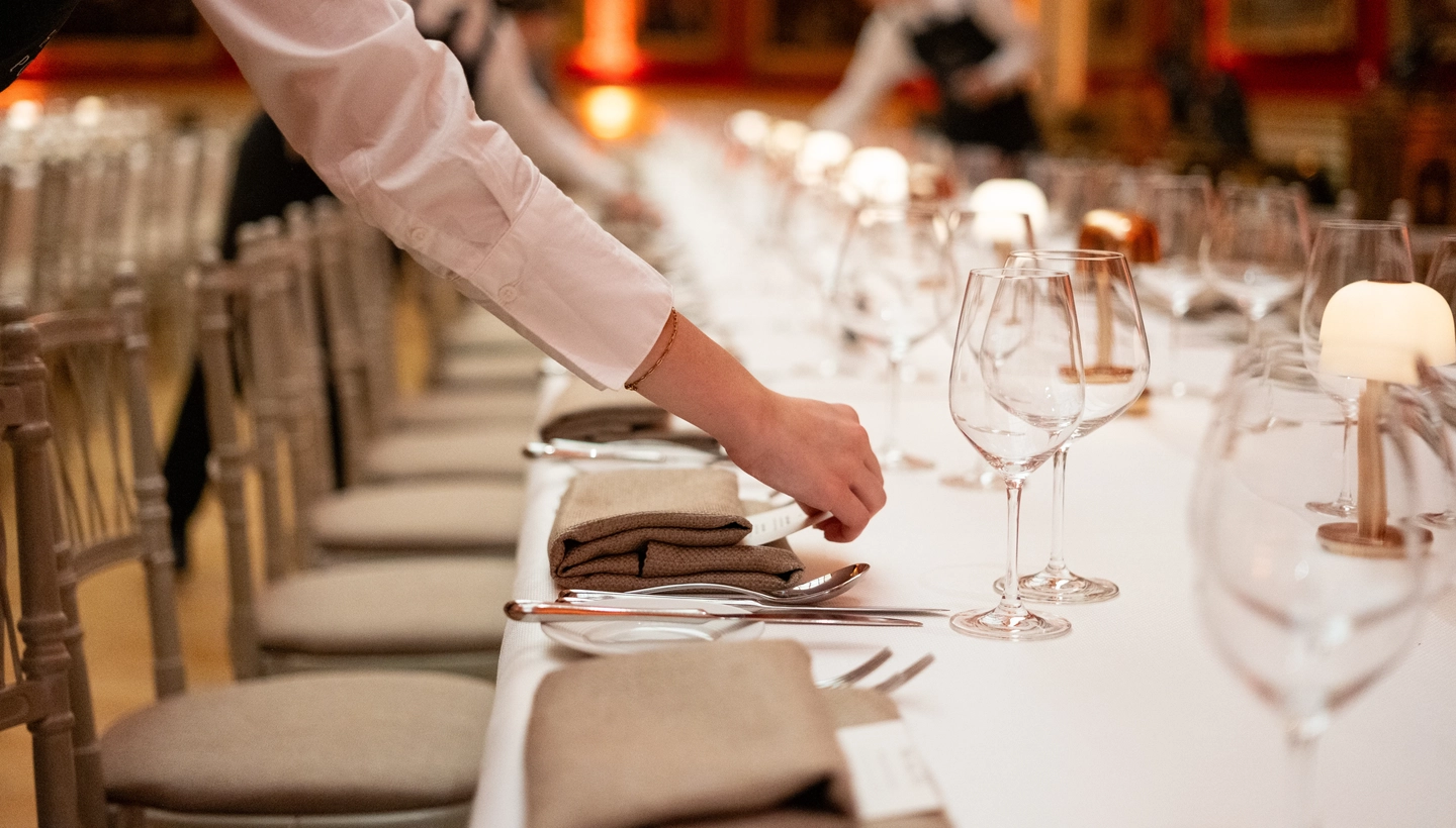 Waiter laying the table at The Wallace Collection