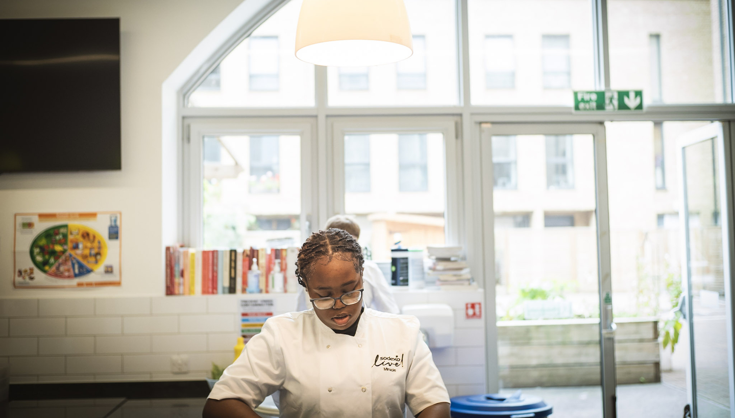 female chef working in kitchen