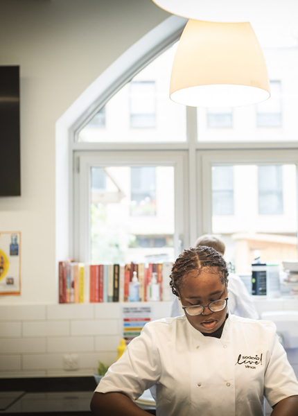 female chef working in kitchen