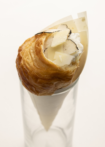 Poached egg croissant, artichoke cream, shaved tomme cheese, sheep's cheese, truffle