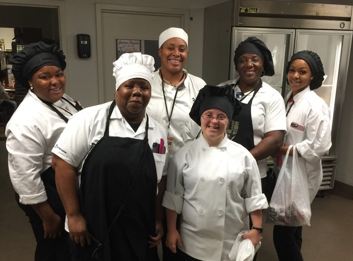 Picture of kitchen crew smiling
